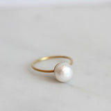 CALYPSO RING FACETED PEARL AND 18 CT GOLD