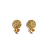 Boucles d’oreilles Mini Luna en or rose 18 carats avec surface texturée et granulation.