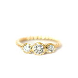 DIAMONDS AND 18 CT GOLD TRILOGY RING